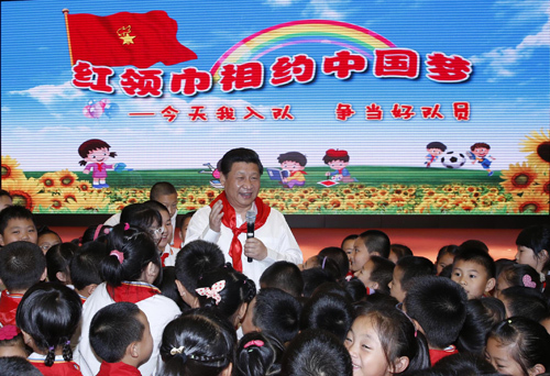 President Xi Jinping celebrates International Children's Day in Beijing at Haidian Minzu Primary School on May 30, 2014. [Photo: China Plus]
