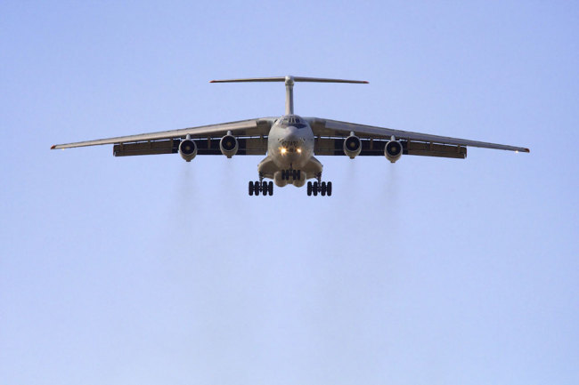China's People's Liberation Army Air Force Illyushin Il-76 prepares to land at Perth International Airport, Australia, after a search mission trying to locate the missing Malaysia Airlines Flight 370 Wednesday, April 16, 2014. [File photo: AP/Pool/Richard Wainwright]