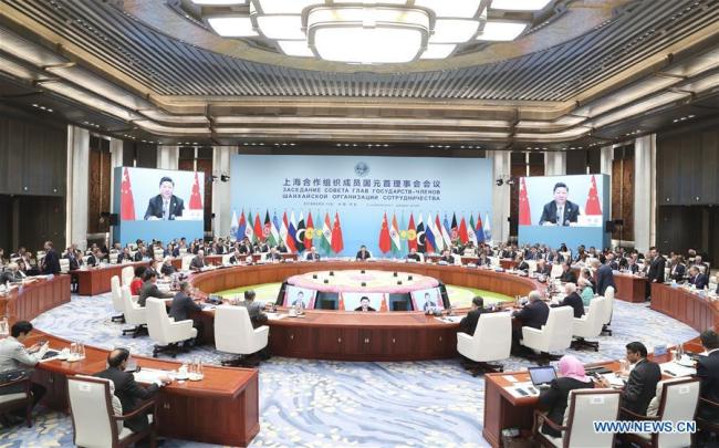 The 18th Meeting of the Council of Heads of Member States of the Shanghai Cooperation Organization (SCO) is held in Qingdao, east China's Shandong Province, June 10, 2018. Chinese President Xi Jinping chaired the meeting and delivered a speech. [Photo: Xinhua/Ding Lin]