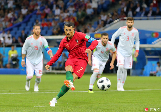 Cristiano Ronaldo of Portugal scores from the penalty spot, Portugal v Spain, Group B, 2018 FIFA World Cup football match, Fisht Stadium, Sochi, Russia, June 15, 2018. [Photo: IC]