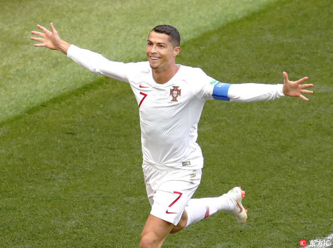 Portugal's Cristiano Ronaldo celebrates after scoring the opening goal during the group B match between Portugal and Morocco at the 2018 soccer World Cup in Moscow, Russia, June 20, 2018. [Photo: IC]