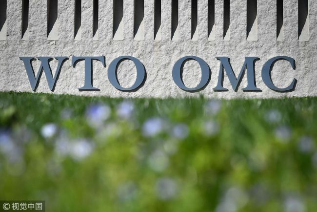 A sign of the World Trade Organization (WTO) is seen at the organization headquarters in Geneva on April 12, 2018. [Photo: VCG]