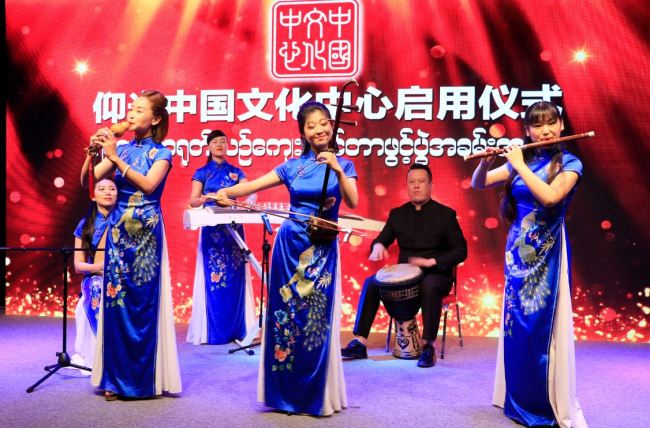 Chinese artists play traditional musical instruments at the opening ceremony of the China Cultural Center in Yangon, Myanmar, on July 7, 2018. [Photo: China Plus/Tu Yun]
