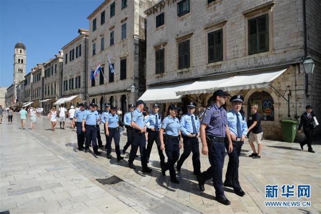 The first ever joint patrol between China and Croatia during tourist season is launched in Dubrovnik on July 15, 2018. [Photo: Xinhua]
