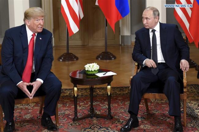 U.S. President Donald Trump (L) meets with his Russian counterpart Vladimir Putin in Helsinki, Finland, on July 16, 2018. U.S. President Donald Trump and his Russian counterpart Vladimir Putin started their first bilateral meeting here on Monday, and they are expected to discuss a wide range of issues. [Photo: Xinhua]