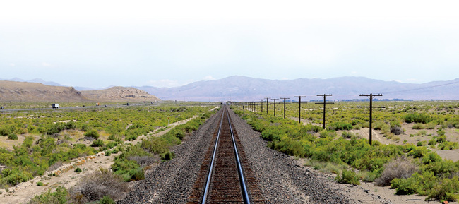 A section of track on the Humboldt Plains stretches into the distance at the same site as it did 150 years ago. Li identified all the sites captured in more than 360 photographs taken by Hart during the 1860s. [Photo provided to China Daily]