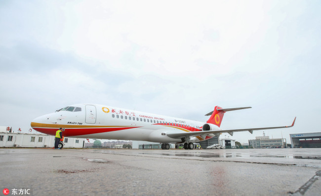 The fourth ARJ21-700 made by the Commercial Aircraft Corp of China (COMAC), the country's first indigenously designed regional jet, is pictured to leave Shanghai for Chengdu Airlines at the Shanghai Dachang Air Base in Shanghai on December 28, 2017. [Photo: IC]