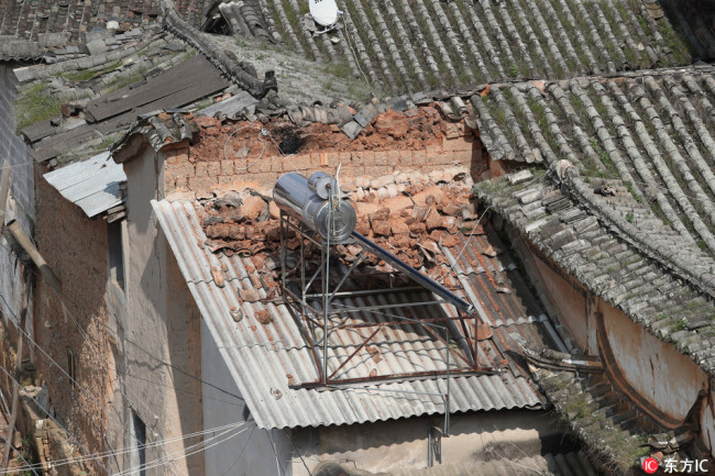 The house that was damaged by the earthquake in Yuxi city, Yunnan province. [Photo: IC]  