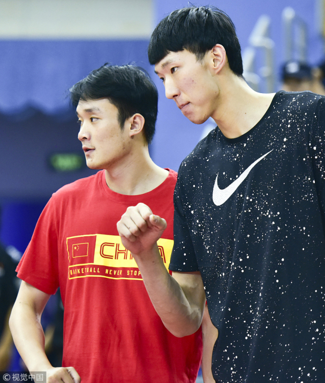 Zhou Qi (right) and Ding Yanyuhang. [File Photo: VCG]