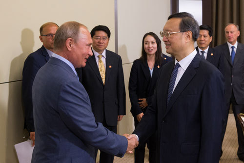 Russian President Vladimir Putin meets Yang Jiechi, member of the Political Bureau of the Communist Party of China (CPC) Central Committee in Sochi on August 15, 2018. [Photo: fmprc.gov.cn]