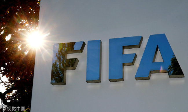 The logo of FIFA is seen in front of its headquarters in Zurich, Switzerland September 26, 2017. [Photo: VCG]