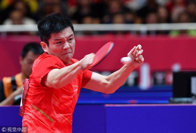 China's Fan Zhendong plays a shot against South Korea's Jeoung Young-sik during their men's team table tennis final match at the 2018 Asian Games in Jakarta on August 28, 2018. [Photo: VCG]