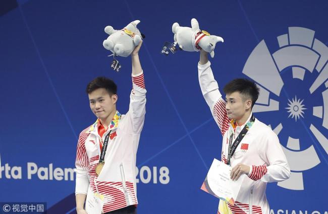 China's Cao Yuan/Xie Siyi win men's 3m synchro springboard title at the 18th Asian Games in Indonesia on Tuesday, August 28, 2018. [Photo: VCG]