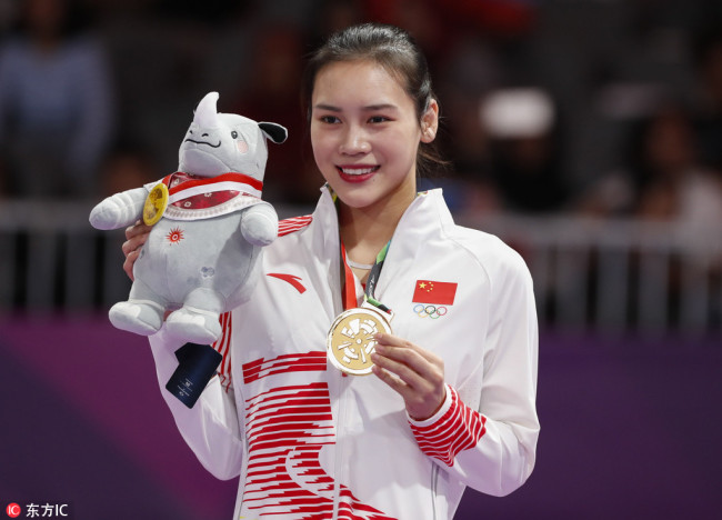 China’s Liu Lingling wins the gold medal in the women's trampoline event at the Asian Games 2018 in Jakarta on August 30, 2018. [Photo: IC]