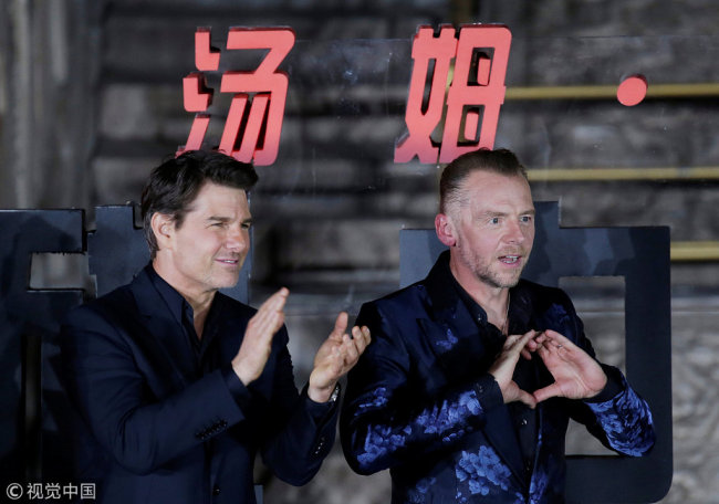 Cast members Tom Cruise (L) and Simon Pegg attend a news conference promoting their upcoming film "Mission: Impossible - Fallout" at the Imperial Ancestral Temple in Beijing, China, August 29, 2018. [Photo: VCG]