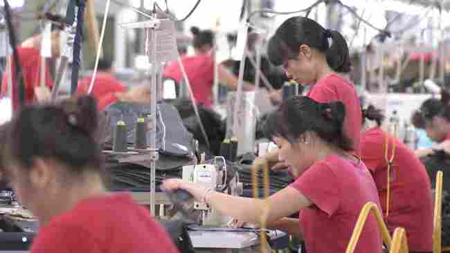 Factory workers at Hodo's assembly lines in Wuxi, Jiangsu Province. [Photo: CGTN]