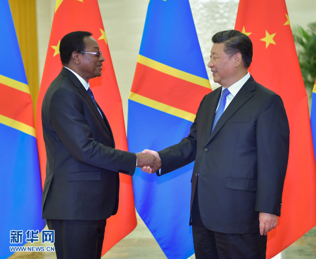 Chinese President Xi Jinping (R) meets with Prime Minister of the Democratic Republic of the Congo Bruno Tshibala at the Great Hall of the People in Beijing, capital of China, Sept. 5, 2018. [Photo: Xinhua]