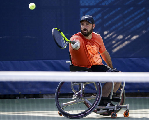David Wagner returns a shot during a practice session for the wheelchair competition at the U.S. Open tennis tournament, Wednesday, Sept. 5, 2018, in New York. [Photo: AP/Darron Cummings]
