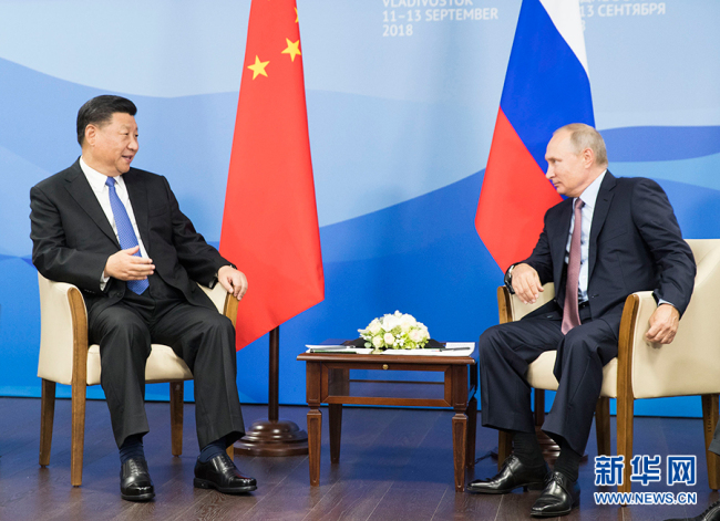 Chinese President Xi Jinping and Russian President Vladimir Putin hold talks in Vladivostok on September 11, 2018. [Photo: Xinhua]