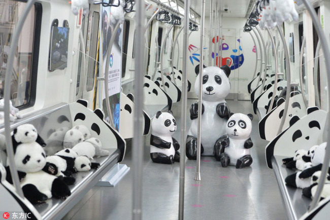Giant panda toys are displayed in a panda-themed subway train in Chengdu, Southwest China's Sichuan province, Sept 12, 2018. [Photo/IC]