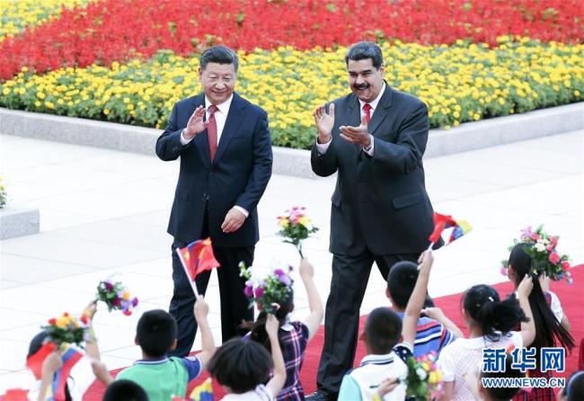 Chinese President Xi Jinping and his Venezuelan counterpart Nicolas Maduro [Photo: Xinhua]