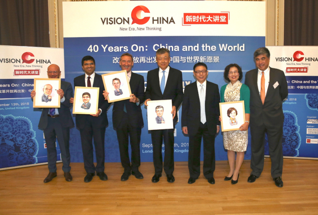 Editor-in-Chief of China Daily Zhou Shuchun (R3) and Rupert Li (R1), the global chief operating officer and a senior partner at King & Wood Mallesons, take picture with guest speakers at China Daily's Vision China event in London, Sept 13, 2018. [Photo: chinadaily.com.cn]