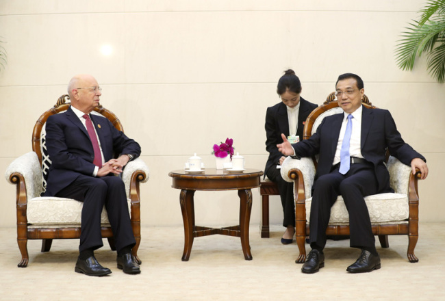 Chinese Premier Li Keqiang meets with Klaus Schwab, World Economic Forum (WEF) founder and executive chair, in Tianjin on Wednesday, September 19, 2018. [Photo: gov.cn]