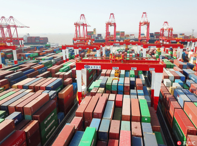 An aerial view of containers at the Yangshan Deep-Water Port in Shanghai, April 10, 2018. [Photo: IC]