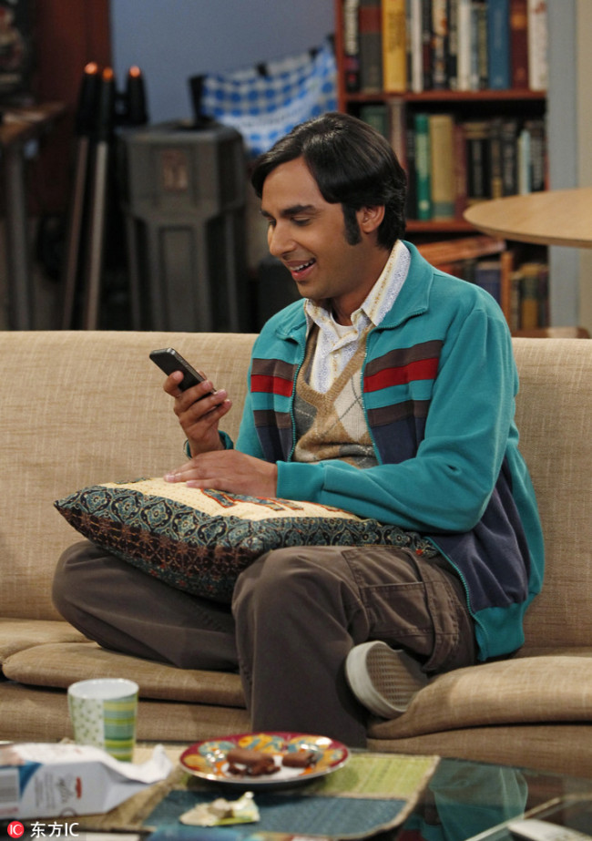 Raj develops a peculiar relationship with his phone's virtual assistant in this still from The Big Bang Theory. [Photo: CBS/Monty Brinton]