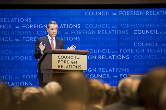 Chinese State Councilor and Foreign Minister Wang Yi speaks while meeting with Richard Haas, president of Council on Foreign Relations, a New York-based think tank, as well as other members of the council on Friday, September 28, 2018. [Photo: fmprc.gov.cn]  