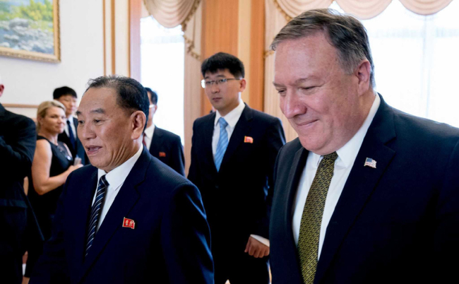 US Secretary of State Mike Pompeo (R) and Kim Yong Chol (L), a DPRK senior ruling party official and former intelligence chief, arrive for a lunch at the Park Hwa Guest House in Pyongyang on July 7, 2018. [Photo: VCG]