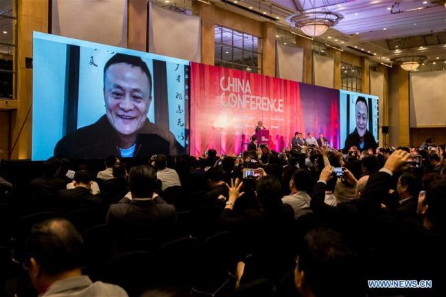 Jack Ma, founder of China's e-commerce giant Alibaba, speaks to audience via video call during the China Conference organized by South China Morning Post in the Malaysia's capital Kuala Lumpur, Oct. 10, 2018. The conference brought together business, academic and political leaders to discuss cooperation between China and Southeast Asia on politics, economy, technology and how to tap opportunities of the Belt and Road Initiative, among others. [Photo: Xinhua/Zhu Wei]