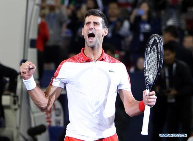 Novak Djokovic of Serbia celebrates after winning the men's singles final match against Borna Coric of Croatia at 2018 ATP Shanghai Masters tennis tournament in Shanghai, east China, Oct. 14, 2018. Novak Djokovic won 2-0 in the final and claimed the title of the event. [Photo: Xinhua/Fan Jun]