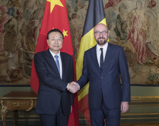 Chinese Premier Li Keqiang (L) meets with Belgian Prime Minister Charles Michel in Brussels, Belgium on Wednesday, October 17, 2018. [Photo: Xinhua]
