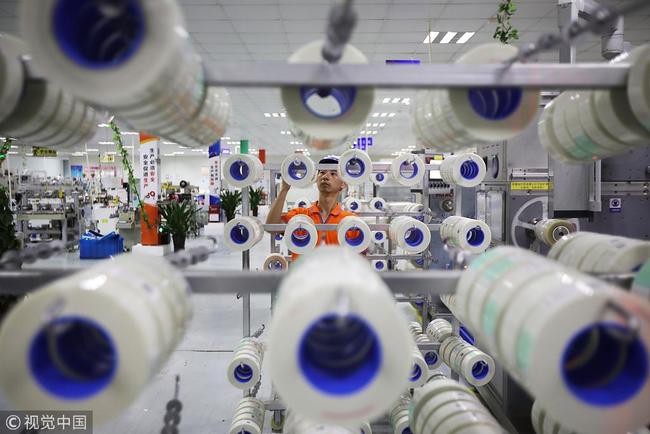 A production line at a factory in Yancheng, Jiangsu Province. [Photo: VCG]