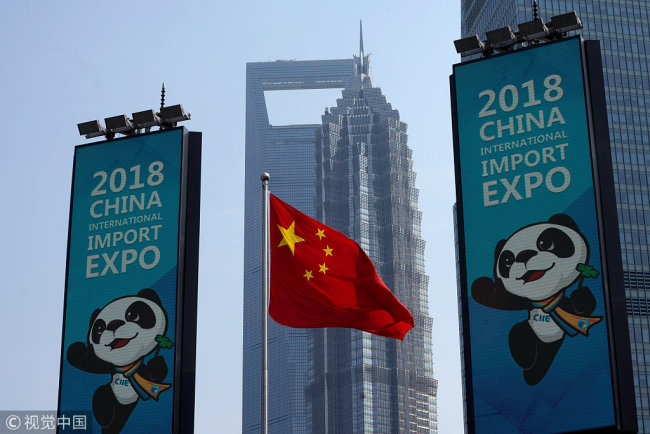 Signs promoting the upcoming China International Import Expo at Lujiazui financial district in Shanghai on Oct 17, 2018. [File Photo: VCG]