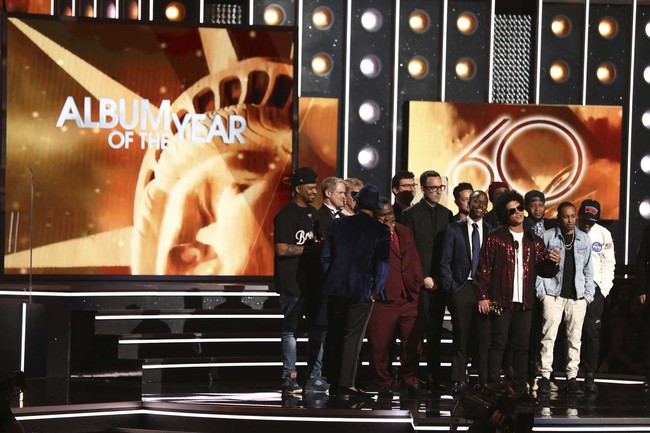 Bruno Mars, front center, accepts the award for album of the year for "24K Magic" at the 60th annual Grammy Awards at Madison Square Garden on Sunday, Jan. 28, 2018, in New York. [Photo: AP]