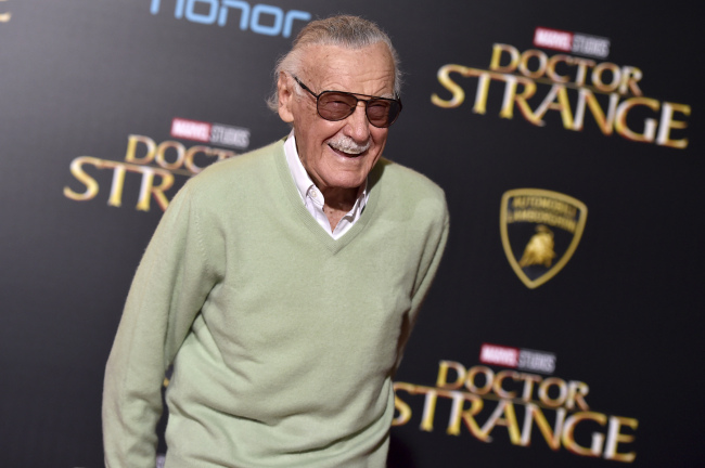 In this Oct. 20, 2016 file photo, Stan Lee arrives at the premiere of "Doctor Strange" in Los Angeles. A judge has found that an attorney who had obtained an elder-abuse restraining order on behalf of Lee does not in fact represent him. Los Angeles Superior Court Judge Pro Tem Ruth Kleman said that she did not recognize Tom Lallas as Lee’s lawyer, and dissolved the temporary restraining order against Lee’s former personal adviser Keya Morgan. [Photo: AP]