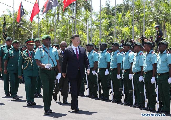 Papua New Guinea (PNG) Governor-General Bob Dadae holds a grand welcome ceremony in honor of Chinese President Xi Jinping in front of the PNG national parliament house prior to their meeting in Port Moresby, PNG, on Nov. 16, 2018. [Photo: Xinhua]