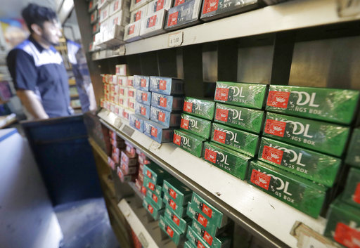 This May 17, 2018 file photo shows packs of menthol cigarettes and other tobacco products at a store in San Francisco. On Thursday, Nov. 15, 2018, FDA Commissioner Dr. Scott Gottlieb pledged to ban menthol from cigarettes, in what could be a major step to further push down U.S. smoking rates. [Photo: AP]