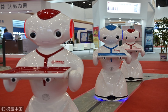 Robots on display at the Appliance and Electronics World Expo in Hefei, Anhui Province, November 16, 2018. [Photo: VCG]