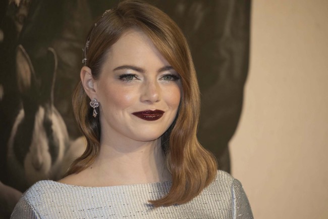 Actress Emma Stone poses for photographers upon arrival at the premiere of the film 'The Favourite' showing as part of the BFI London Film Festival in London, Thursday, Oct. 18, 2018. [Photo: AP]