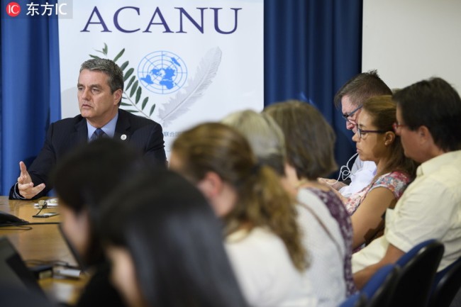 Brazilian Roberto Azevedo, Director General of the World Trade Organization, WTO, speaks to journalists from ACANU (Association of the Accredited Correspondents to the United Nations), during a press conference, at the European headquarters of the United Nations, in Geneva, Switzerland, Wednesday, July 25, 2018. [Photo:IC]