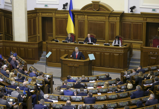 Ukrainian President Petro Poroshenko speaks during a parliament session in Kiev, Ukraine, Monday, Nov. 26, 2018. [Photo: AP]