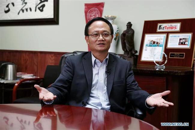 Sun Jianguo, co-founder of Wisconsin International Academy, receives an interview with Xinhua in Milwaukee, Wisconsin, the United States, on Oct. 26, 2018. [Photo: Xinhua]