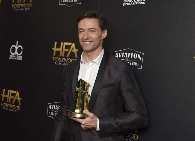 Hugh Jackman, winner of the Hollywood actor award for "The Front Runner" poses in the press room at the Hollywood Film Awards on Sunday, Nov. 4, 2018, at the Beverly Hilton Hotel in Beverly Hills, Calif. [Photo: AP]