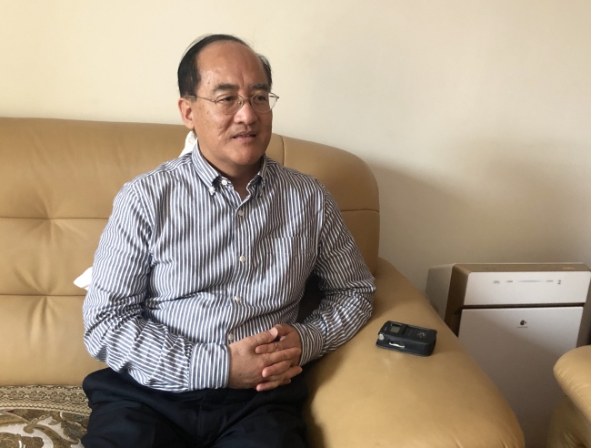 Wang Weihua, China's former charge d'affaires in Panama and a former representative of China's Office of Commercial Development in Panama, during an interview with a China Plus reporter in Beijing on Wednesday, November 29, 2018. [Photo: China Plus]