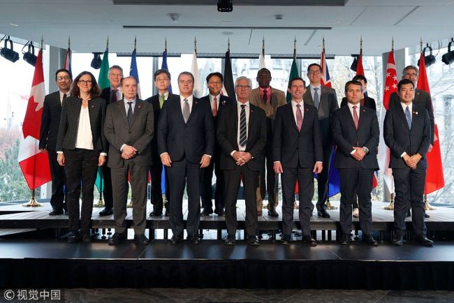 Ministers pose for a group photo at the World Trade Organization reform talks in Ottawa, Ontario, on October 25, 2018. [Photo: VCG]