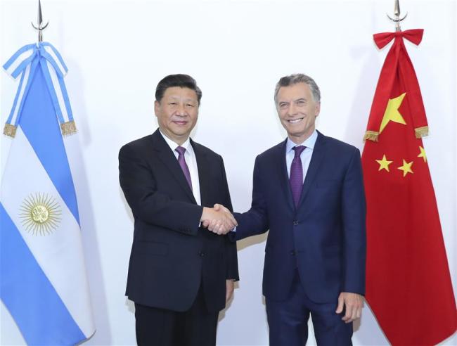 Chinese President Xi Jinping (L) meets with his Argentine counterpart Mauricio Macri in Buenos Aires, capital of Argentina, on Sunday, December 2, 2018. [Photo: Xinhua]