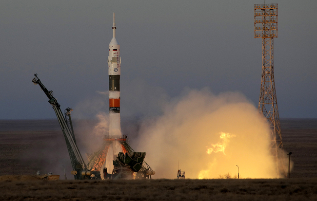 The Soyuz-FG rocket booster with Soyuz MS-11 space ship carrying a new crew to the International Space Station, ISS, blasts off at the Russian leased Baikonur cosmodrome, Kazakhstan, Monday, Dec. 3, 2018. [Photo: AP/Dmitri Lovetsky]